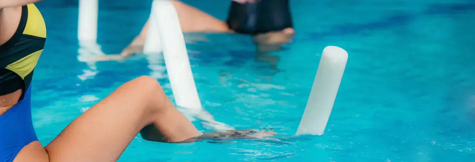 Person undertaking physio exercises in a pool